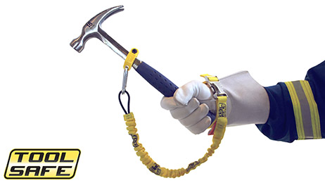 Man holding hammer with ToolSafe® Clamp and Wrist Lanyard.